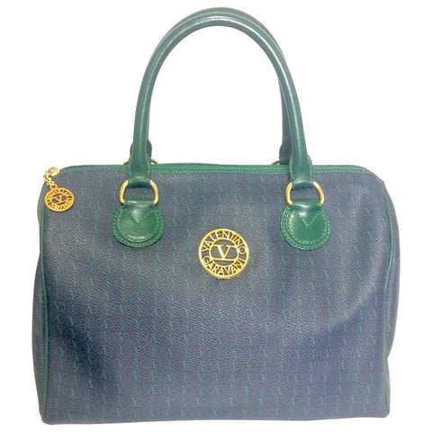 Vintage Valentino Garavani blue and green speedy bag style handbag with golden logo cutout motifs. Valentino mini duffle purse for daily use.
