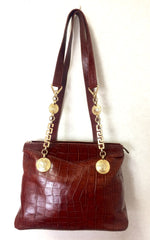 Vintage Gianni Versace brown croc-embossed leather shoulder tote bag with golden hardware and medusa charms.