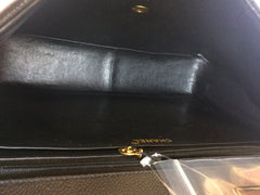 Vintage CHANEL black 2.55 jumbo caviar leather large shoulder bag with golden CC Vertical stitch. Classic caviar leather