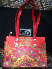Vintage Gianni Versace gorgeous red orange and multi color ethnic and flower design shoulder, tote bag with silver medusa motifs. Lady Gaga