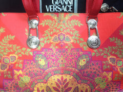 Vintage Gianni Versace gorgeous red orange and multi color ethnic and flower design shoulder, tote bag with silver medusa motifs. Lady Gaga