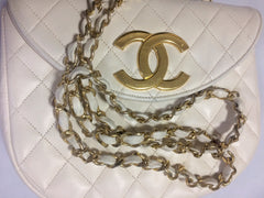 Reserved for Jessica. Vintage CHANEL ivory white lambskin 2.55 chain shoulder bag with large golden CC motif and oval flap.