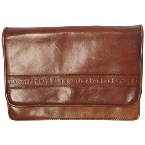 Vintage Yves Saint Laurent genuine brown leather mini document bag, clutch purse with embossed logo. Classic unisex style YSL purse