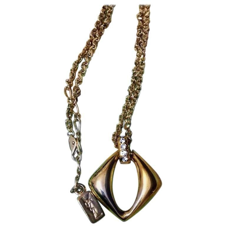 Heart pendant necklace in 18K yellow gold | Saint Laurent | YSL.com