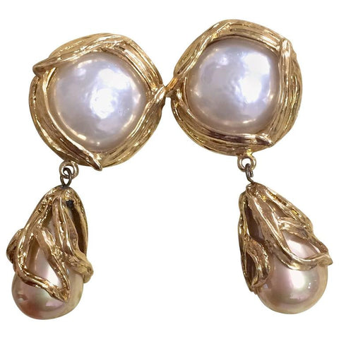 Vintage Yves Saint Laurent arabesque design extra large dangling earrings with round and teardrop white faux pearls.  Rare YSL jewelry.