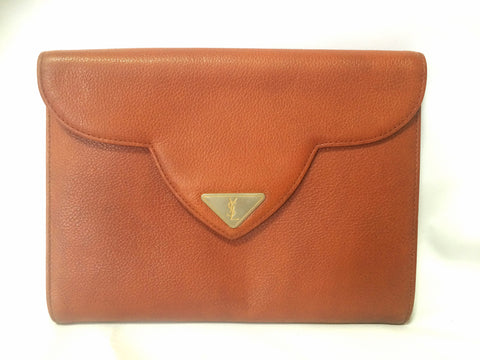 Vintage Yves Saint Laurent genuine brown leather clutch purse with beak tip flap and triangle embossed logo motif. Classic YSL bag.