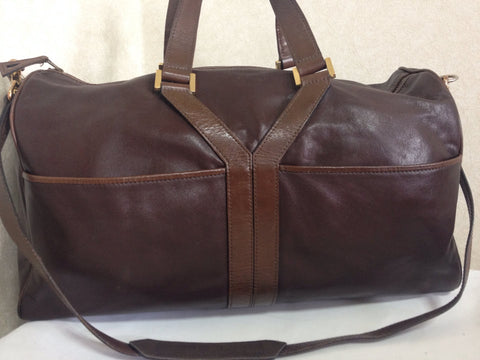 70's, 80's vintage Yves Saint Laurent genuine dark brown leather travel and daily use duffle bag. Classic unisex style YSL purse